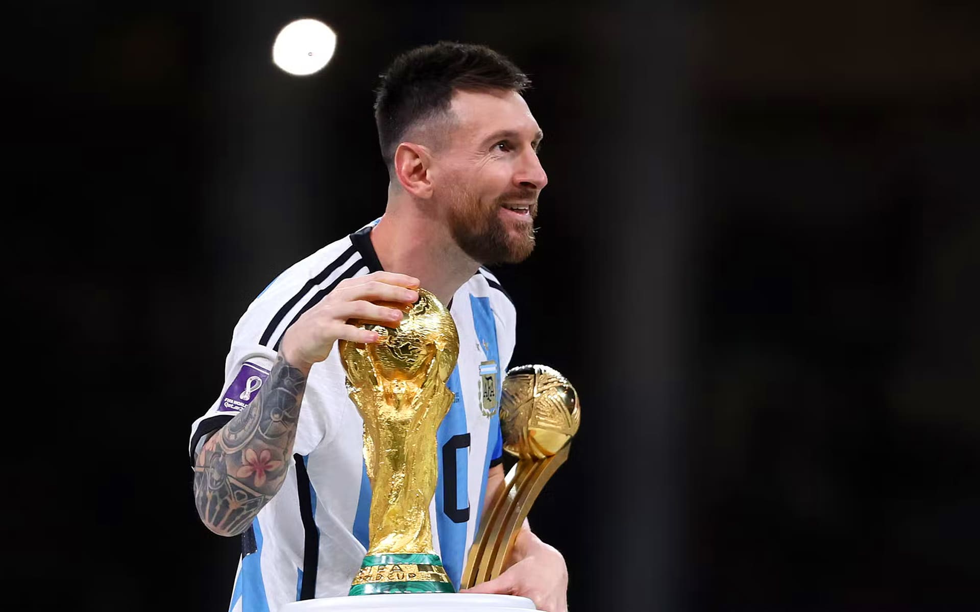 Messi Holding World Cup Wallpapers